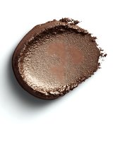 Crushed brown eyeshadow powder smear on white background, showing texture and shimmer of cosmetic product. Isolated makeup swatch for beauty content.