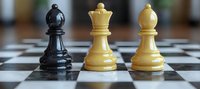 Chess pieces on board showing black bishop and white pieces in strategic position, close up view with selective focus and blurred background for game strategy concept.