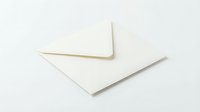 Closed white paper envelope on a light background, symbolizing mail, correspondence, and communication for business or personal use.