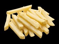 Golden crispy french fries isolated on transparent background, ready for t-shirt designs, clipart, stickers, print-on-demand products, and sublimation projects.