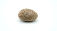 Smooth brown speckled river rock stone isolated on white background for natural decoration and landscaping design projects.
