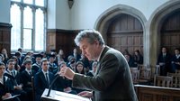 Senior male lawyer presenting case in historic courtroom with wooden panels and gothic windows during legal proceedings.
