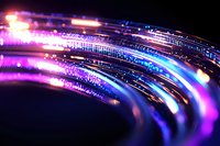 Abstract light trails in vibrant pink and blue neon colors against dark background create dynamic motion effect, suitable for technology and communication themes.