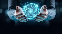 Hands holding glowing blue energy sphere with swirling light effect, representing innovation, technology, and digital power for futuristic business concepts.