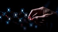 Male hand touching glowing bitcoin network connection on dark background, illustrating cryptocurrency blockchain technology and digital financial transactions.