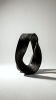Abstract black sculptural form with curved flowing lines creating elegant loop shape on neutral background for modern art and design projects.