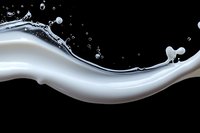 Flowing white liquid wave with splashing droplets against black background creates dynamic motion effect, suitable for cosmetic and beverage advertising.