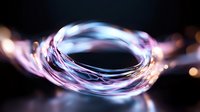 Glowing circular light trails with colorful iridescent reflections against dark background, creating abstract energy ring effect.