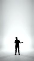 Silhouette of male professional in business suit standing with open hand gesture on neutral background, suitable for corporate presentations and business communications.