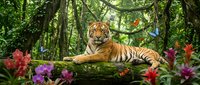 Tiger resting on a log in lush jungle surrounded by vibrant flowers and vines, wildlife and nature scene for editorial and conservation projects.