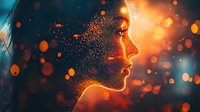 Female profile silhouette dissolving into glowing orange particles against dark background with bokeh lights, creating magical atmospheric effect.