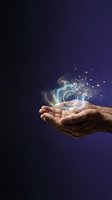 Man's hand holding glowing camera icon with sparkling light particles on dark blue background. Concept for photography, digital content creation, media technology, and creative services.