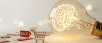 Creative lightbulb with glowing brain filament symbolizing innovative ideas for business strategy, marketing solutions, and entrepreneurial thinking concepts.