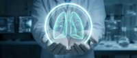 Hands holding glowing lungs hologram in modern office environment, representing respiratory health, medical technology, and healthcare innovation for digital wellness concepts.