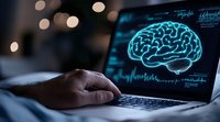Glowing blue brain hologram on laptop screen with person working in dark room, neural activity waves and medical data visualization for neuroscience research.