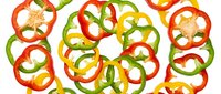 Fresh sliced bell peppers in red, yellow, and green isolated on white background, ready for culinary design projects and food packaging.