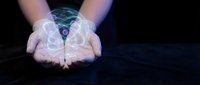 Hands holding glowing brain hologram with neural network connections on dark background, representing artificial intelligence, technology innovation, and digital transformation.