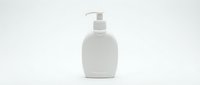 White liquid soap dispenser bottle with pump on isolated background, ready for product design, packaging mockups, and cosmetic branding applications.