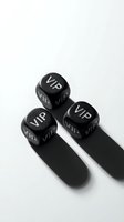 Black dice with VIP text on white background casting shadows for luxury gaming and exclusive entertainment concepts.