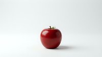 Fresh red apple isolated on white background for healthy eating and nutrition concepts.