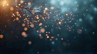 Magical winter branch silhouette against dark blue background with glowing golden bokeh lights and falling snow creating dreamy atmosphere.
