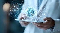 Glowing blue sphere with sparkles emerging from tablet device held by professional in white coat, representing digital innovation and future technology.