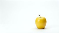 Fresh yellow apple isolated on white background ready for healthy eating and nutrition design projects.