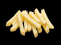Golden crispy french fries isolated on transparent background, ready for t-shirt designs, clipart, stickers, print-on-demand products, and sublimation projects.
