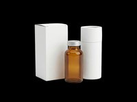 Amber glass bottle with white cylindrical and rectangular packaging containers isolated on transparent background, ready for cosmetics, skincare, supplements, and product mockup designs.