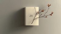 Minimalist composition with 2026 planner and delicate spring branch with red buds emerging from book pages, symbolizing growth and new beginnings against neutral wall.