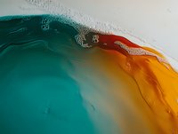 Abstract fluid art with turquoise and orange liquid colors merging in smooth waves, creating dynamic marble effect with white foam bubbles on surface.