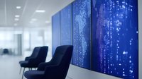 Digital data visualization on blue LED wall display in modern minimalist office interior with empty chairs, representing technology and innovation space.