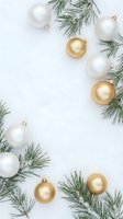 White and gold ornaments with evergreen branches arranged on white background, ideal for holiday greeting cards, seasonal marketing, and festive design projects.