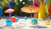 Colorful paper cocktail umbrellas arranged on beach sand creating summer vacation mood with vibrant decorative elements and palm leaves in soft focus background.