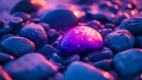 Smooth wet pebbles illuminated by vibrant purple and pink light creating mystical atmosphere with water droplets and bokeh effect on dark stones.