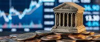 Miniature classical building with columns sits on scattered coins against blurred financial charts and data displays, representing banking and investment concepts.