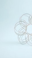 Tangled metallic wire coils arranged on white background, isolated design element suitable for graphic design, web layouts, and creative projects.
