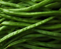 Fresh green string beans in macro view showing natural texture and pattern. Raw organic vegetables background for healthy eating and cooking concepts.