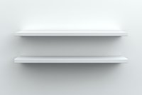 Empty white floating shelves casting soft shadows on light gray wall, minimalist modern interior design element for product display and storage.