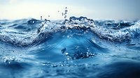 Ocean wave with crystal clear water splashing and creating dynamic motion in deep blue sea, macro photography capturing water drops and ripples in natural sunlight.