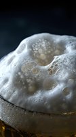 Microscopic cellular structure with porous surface and organic bubbles for scientific research and medical education presentations.