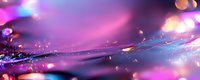 Dreamy abstract background with pink and blue bokeh lights, water drops and reflective surface creating magical atmospheric effect with blurred motion.