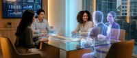 Business team meeting with holographic colleagues in modern conference room showcasing future of remote work and virtual collaboration technology.