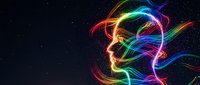 Vibrant neon light trails creating dynamic swirls and curves against dark starry background for digital art projects and modern design concepts.