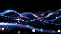 Glowing blue waves with sparkles and bokeh lights on dark background create magical atmosphere for abstract design projects and presentations.