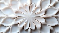 Elegant white floral wall art sculpture with layered petals creating depth and shadow. Decorative architectural element showcasing modern minimalist design.