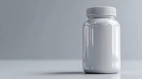 White plastic jar with ribbed cap on light gray background, minimalist product photography with soft shadows and copy space for packaging mockup design.