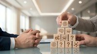 Business strategy concept with wooden blocks featuring gears and question marks being arranged by professional hands in modern office setting.
