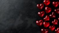 Red glass heart shapes scattered on dark black background with copy space, romantic Valentine's Day concept for greeting cards and social media posts.