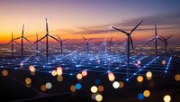 Wind turbines generating renewable energy at sunset with digital network connections representing smart grid technology and sustainable power infrastructure.